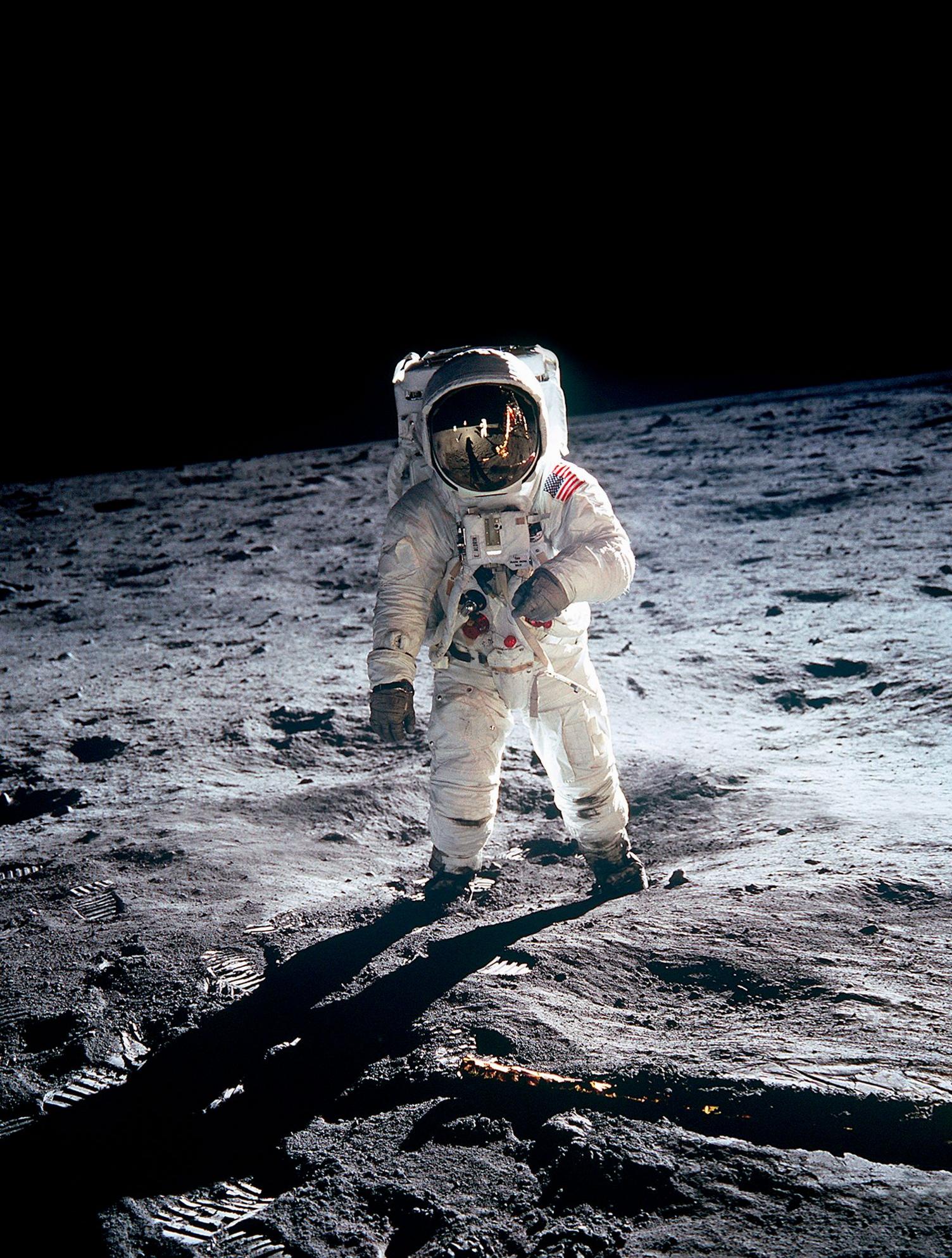 Nasa astronaut, Buzz Aldrin, the second man on the Moon, photographed during the Apollo 11 mission. Neil Armstong is reflected in his visor.