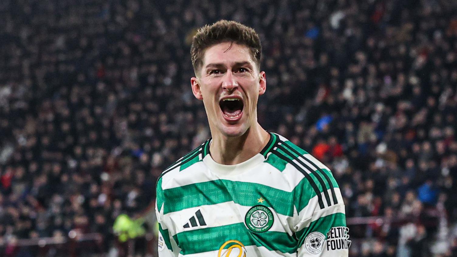 Celtic's Tomas Cvancara celebrates as Hyunjun Yang scores to make it 2-1 during a Premiership match between Heart of Midlothian and Celtic at Tynecastle Park