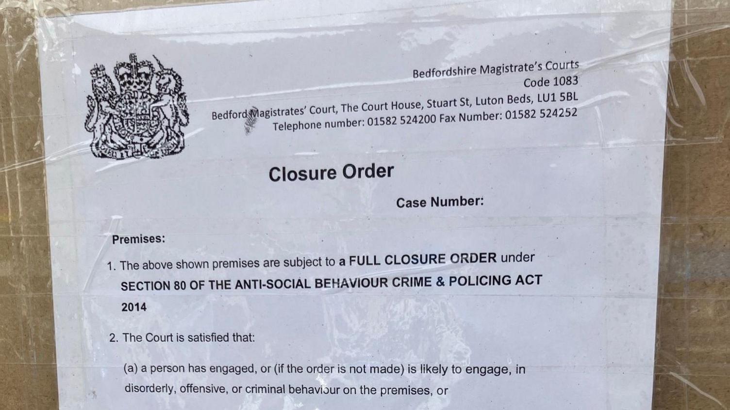 The closure order printed and put on the front of the closed shop