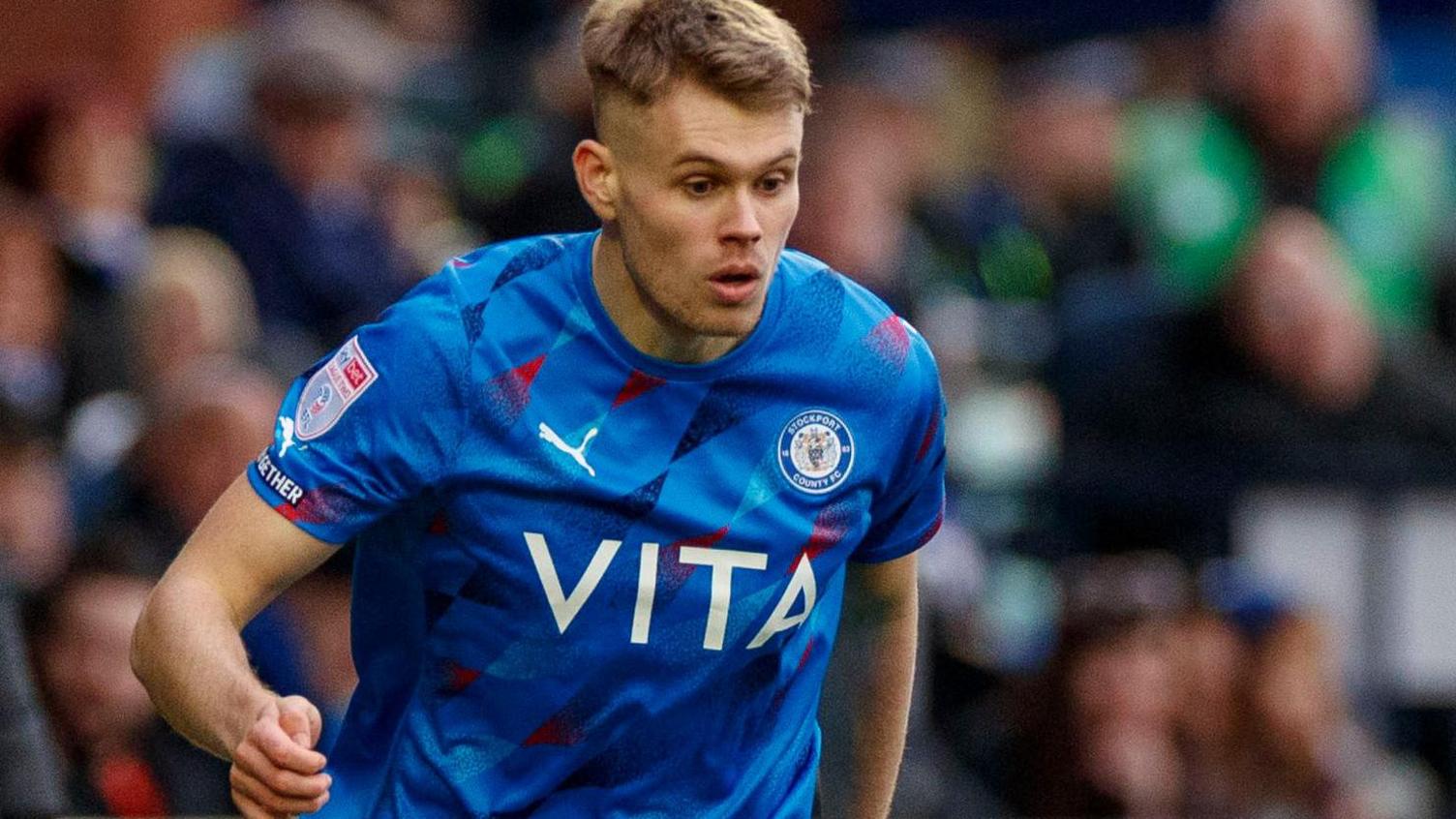 Lewis Cass in action for Stockport County