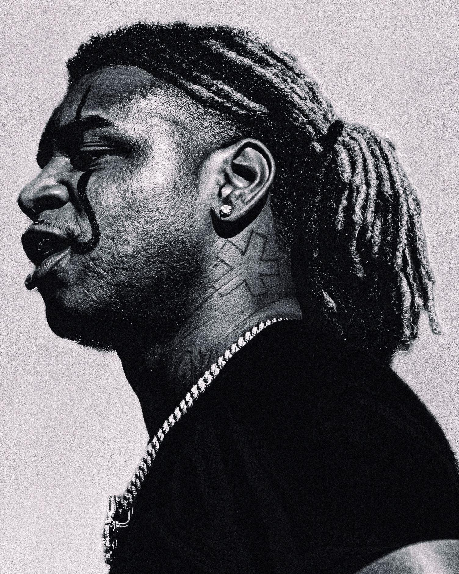 A side view of US rapper and record producer Ken Carson in black and white