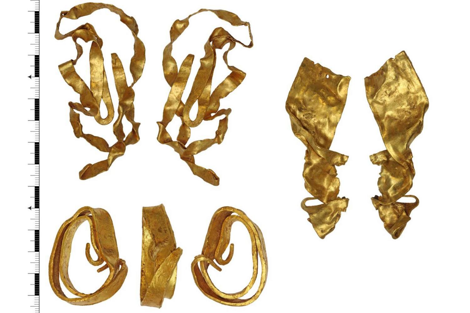 Three bent and twisted gold objects photographed from various angles against a white background. One resembles a bangle but the others are very bent and hard to identify from the images.