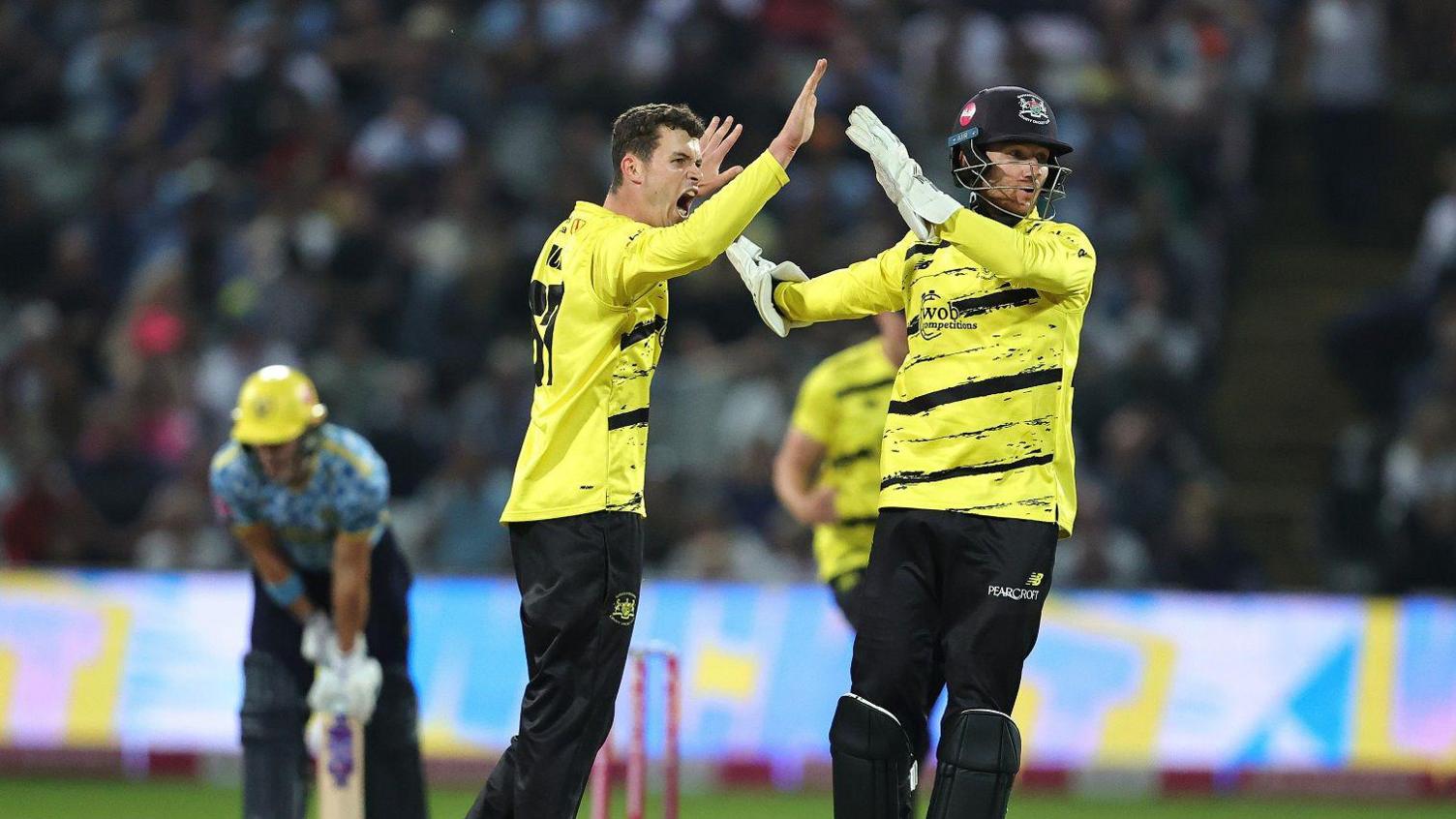 Gloucestershire players celebrate taking a wicket at Edgbaston as they won a place in the T20 Blast finals day