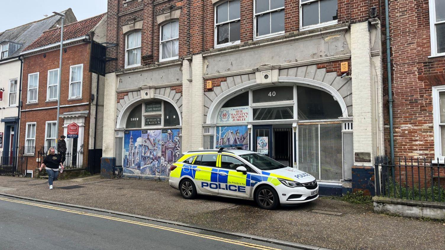 A police car outside a property on King Street, Great Yarmouth