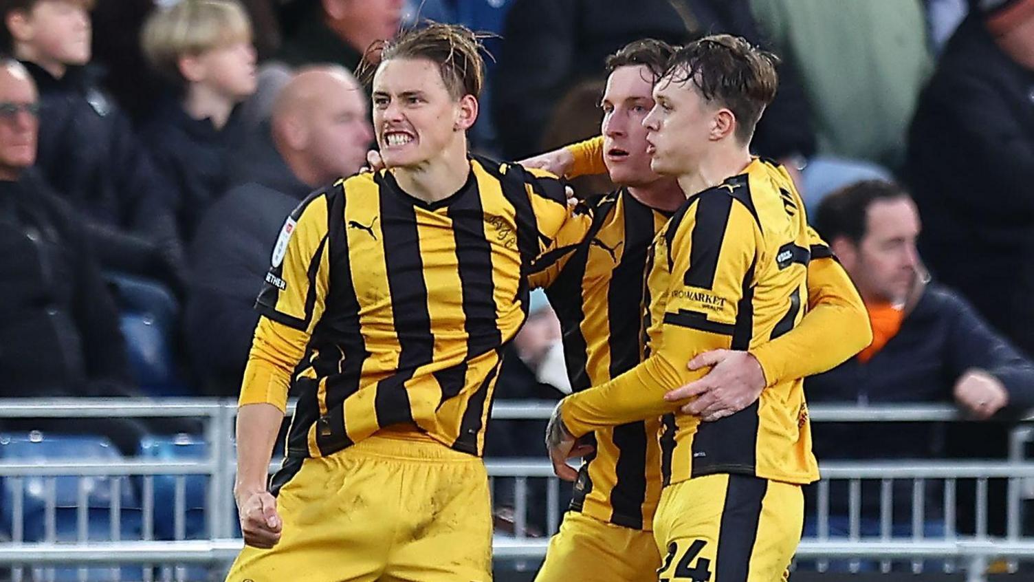 Port Vale's Ben Waine (left) celebrates scoring his side's equaliser against Luton Town with team-mates