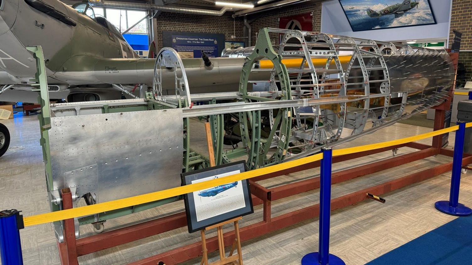 The fuselage of a Spitfire AA810 is currently on display at the Spitfire and Hurricane Museum in Manston, Kent