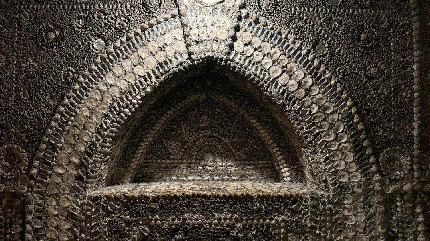 A mural that was created with shells.