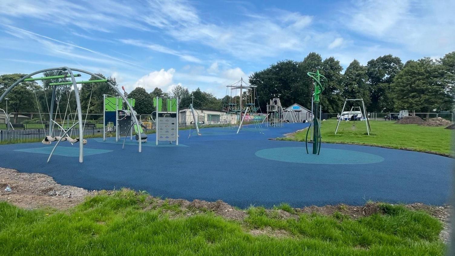 A general view of the play park at Hammonds Pond, with blue rubber matting.