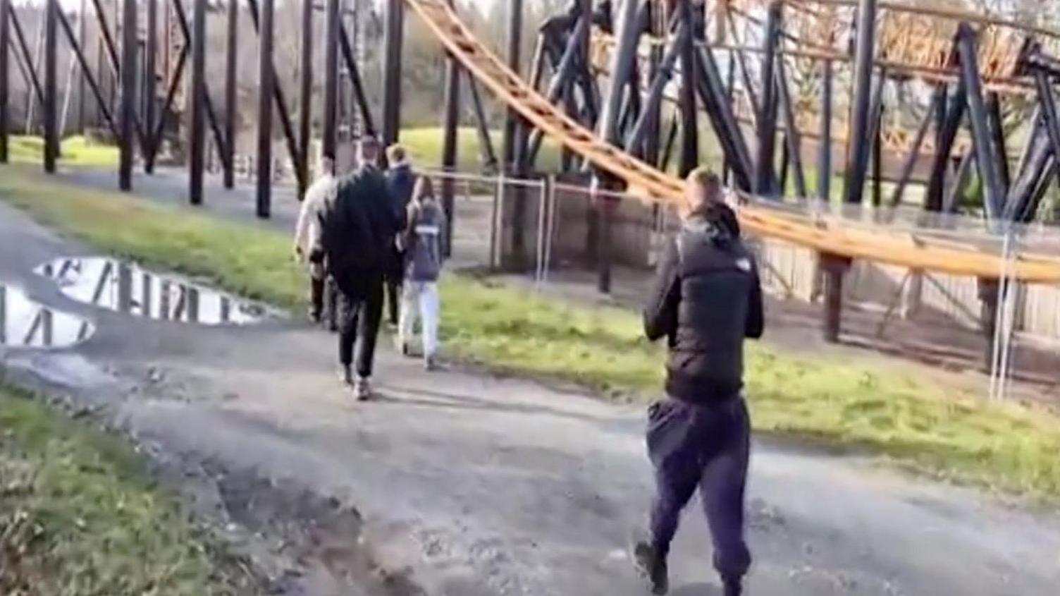 Grab from Youtube video showing people wandering around the theme park.
