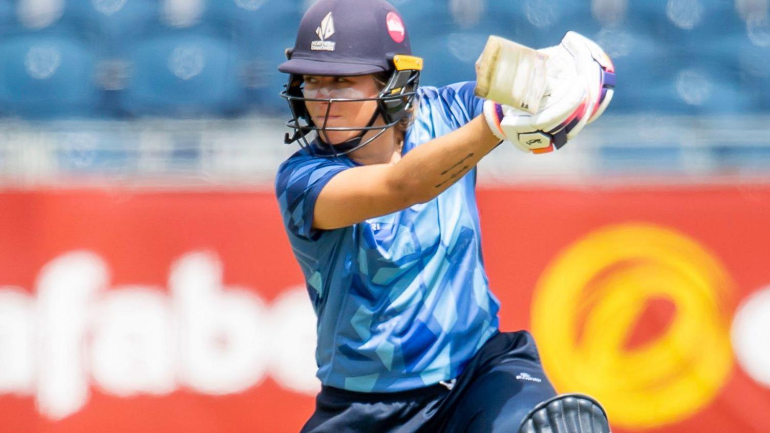 Dutch international Sterre Kalis tucks into the Lancashire Thunder bowling on the off side