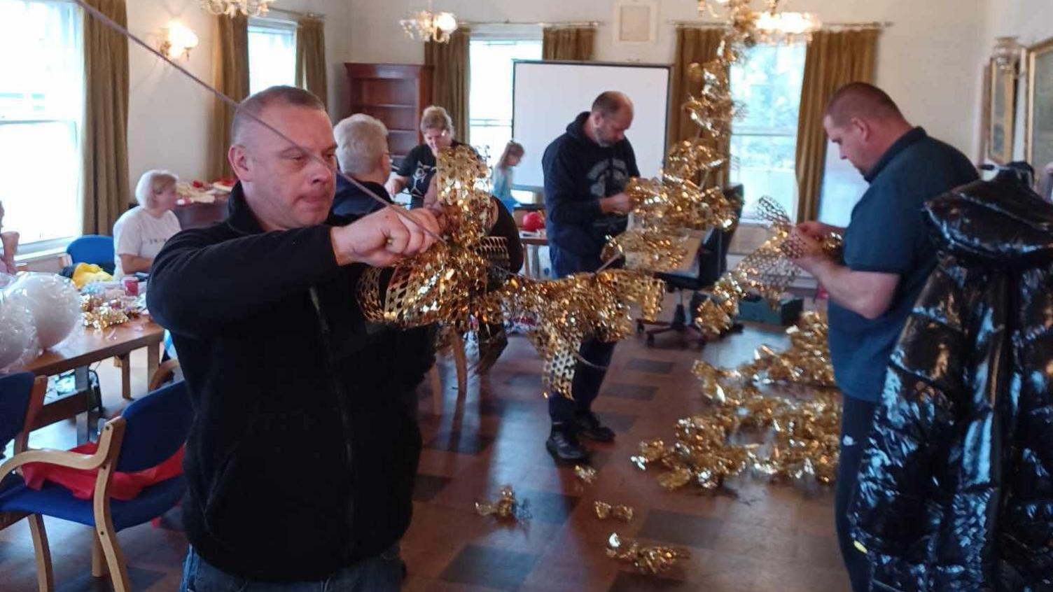 Lithuanian community making Christmas decorations in Wisbech