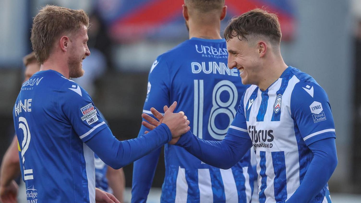 Joel Cooper (right) celebrates scoring his second goal against Glenavon