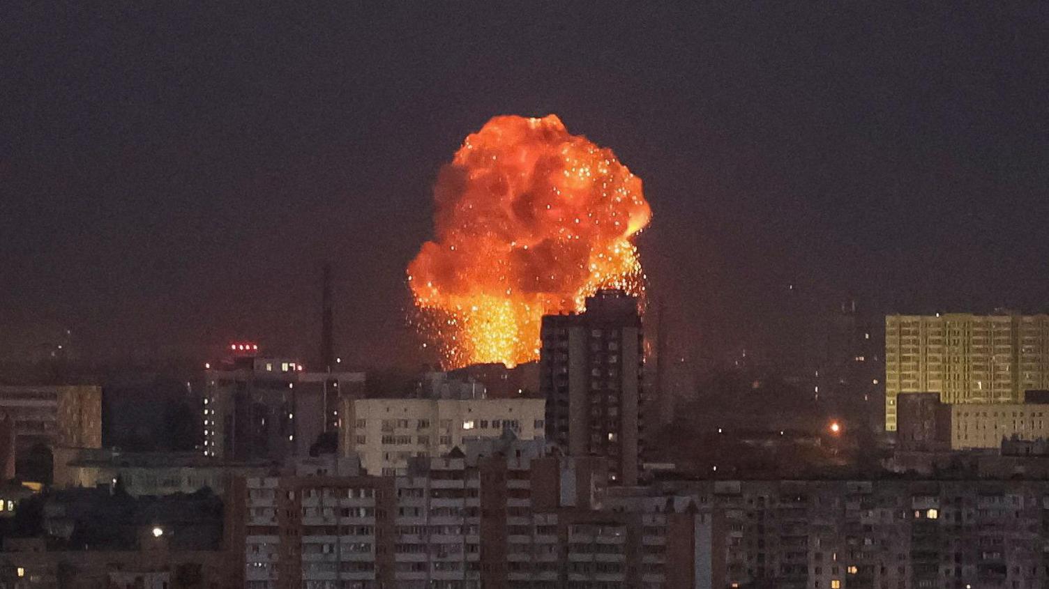 An explosion is seen in the sky above Kyiv following Russian missile strikes on the city