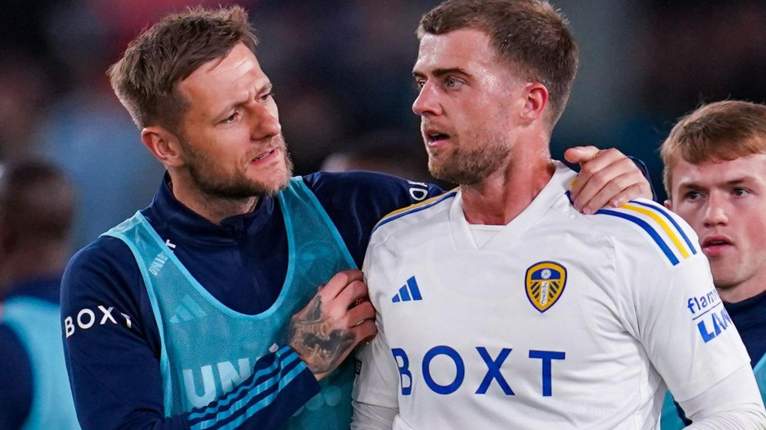 Liam Cooper (left) and Patrick Bamford in conversation after a Leeds United match