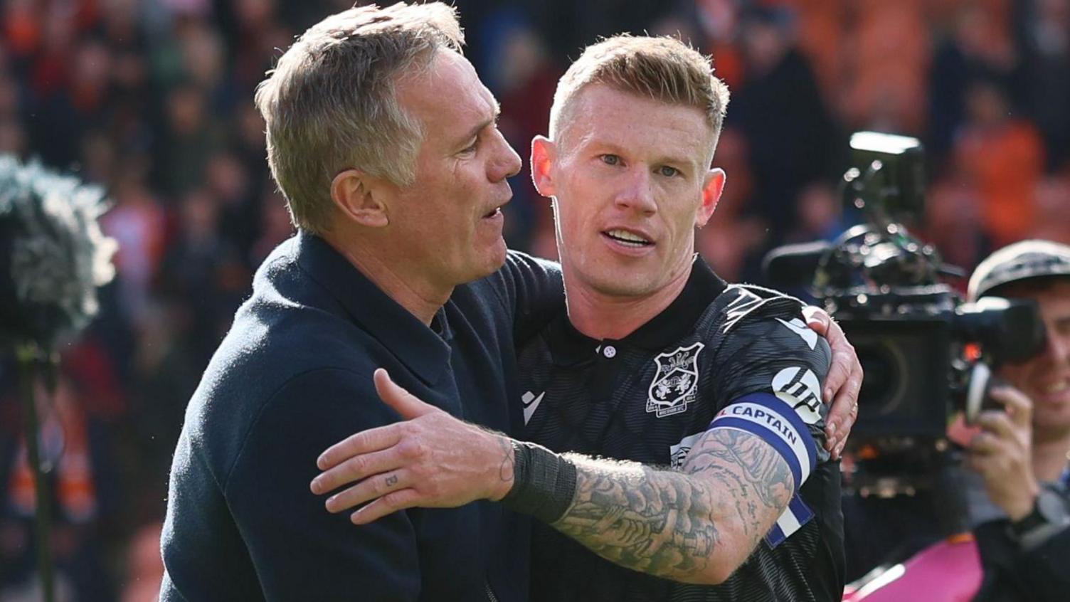 Pahil parkinson and James McClean embrace in celebration