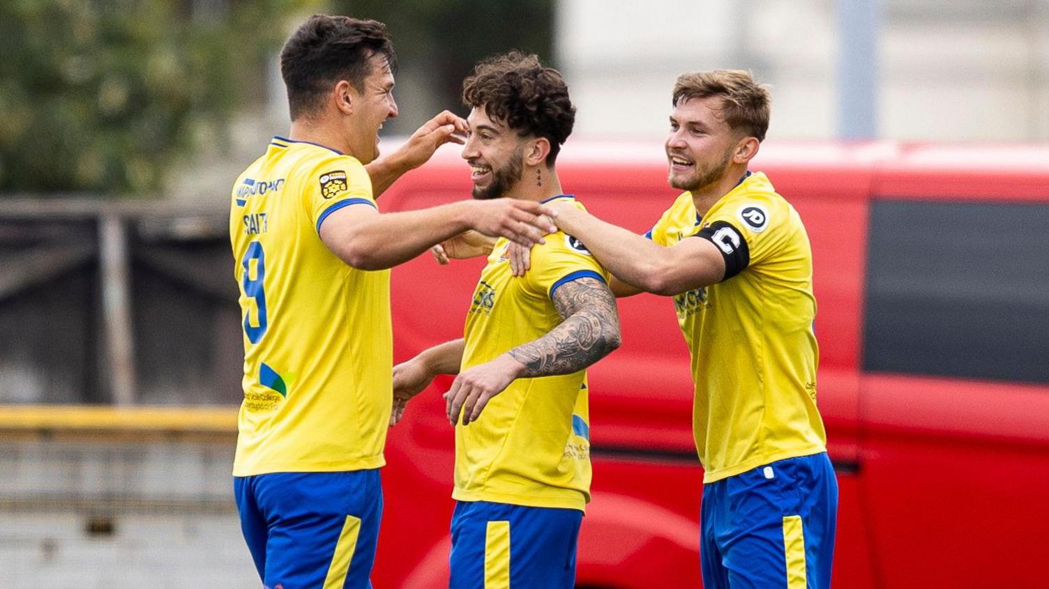 Ollie Hulbert celebrates after scoring Barry's winner against Flint