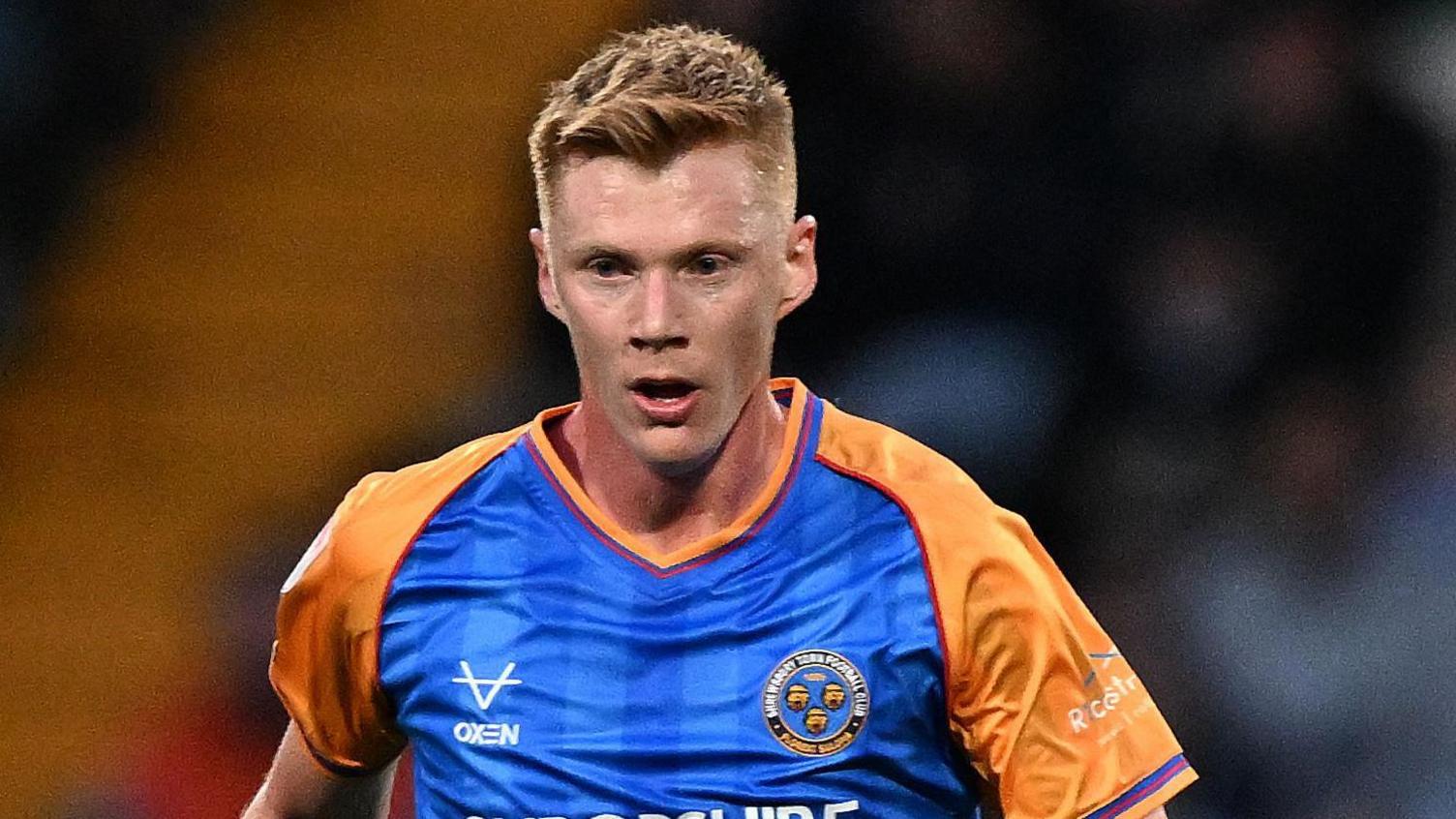 Sam Clucas playing for Shrewsbury Town