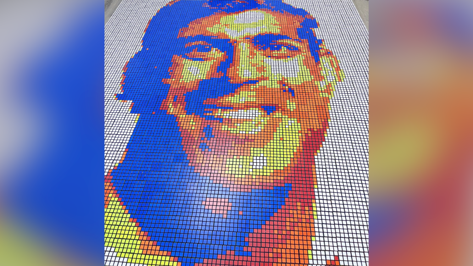 A portrait of the former prime minister Rishi Sunak made of thousand of colourful Rubik's cubes