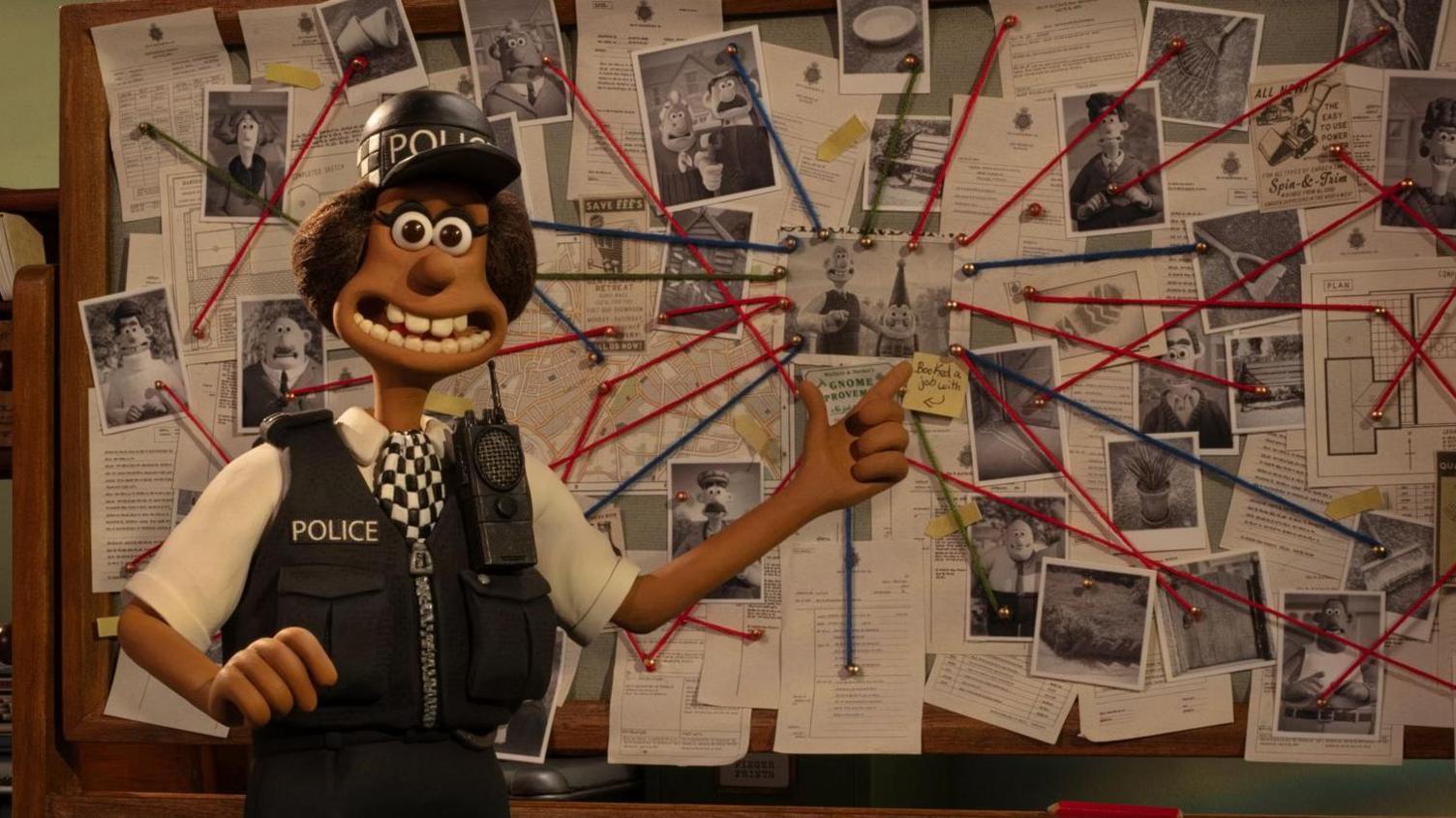 PC Mukherjee in the stop-motion film, animated comedy Wallace & Gromit: Vengeance Most Fowl. She is seen in police uniform pointing to the centre of an evidence board covered in pieces of paper, with red and blue strings pointing towards the centre images of Wallace and Norbot. 

