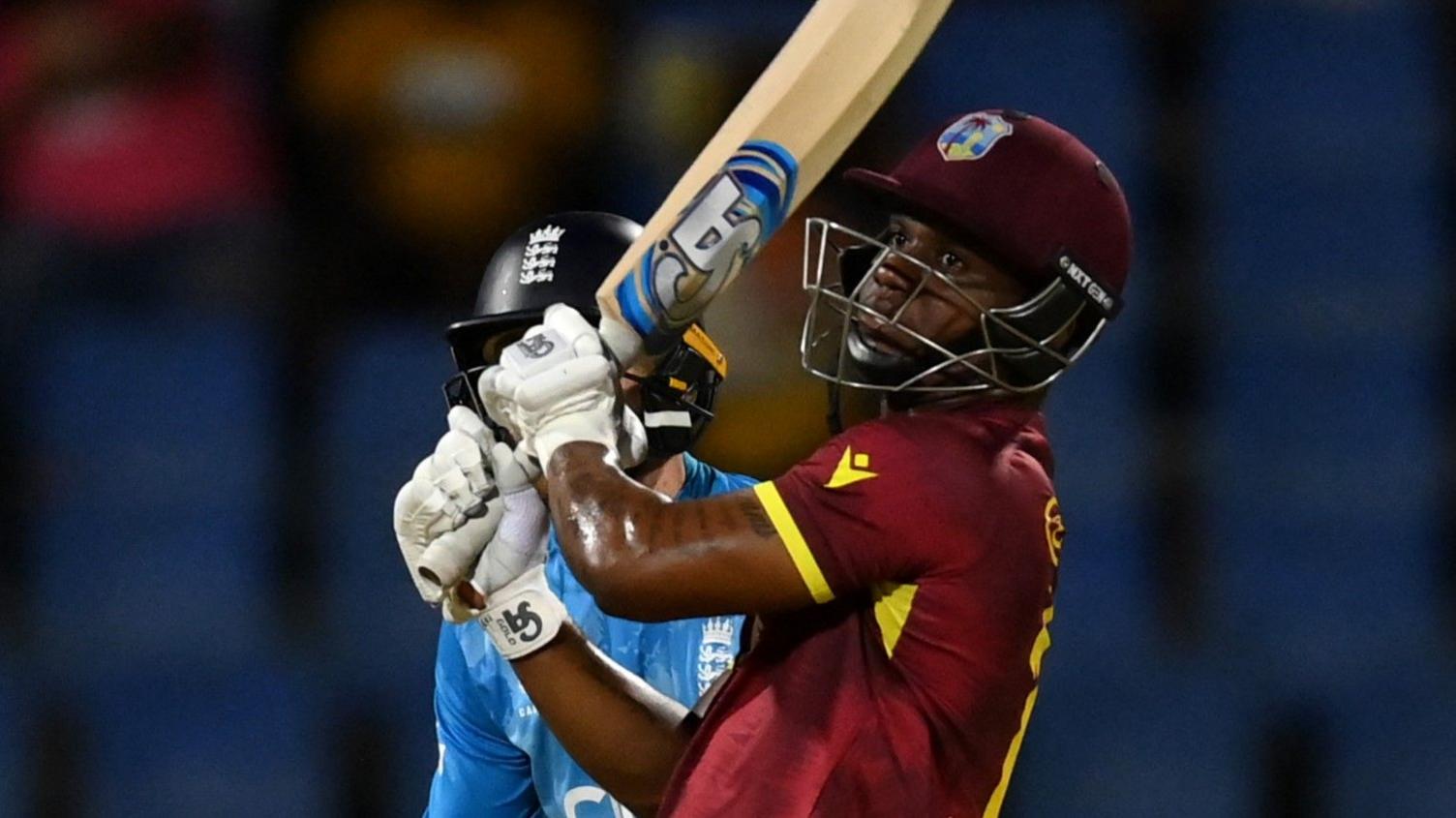 Evin Lewis hits a boundary against England