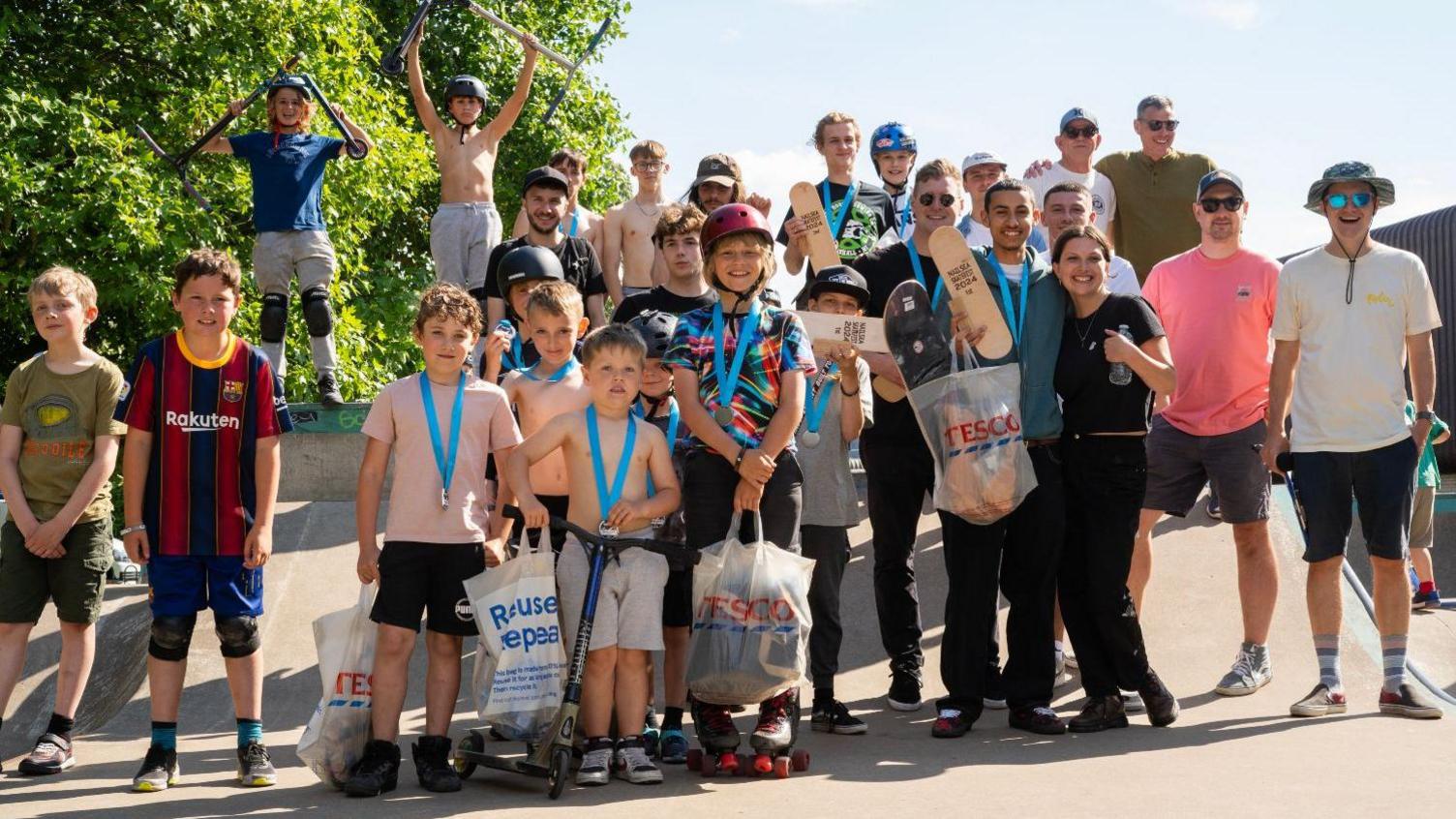 A group of young people smile for the camera at the Nailsea Skate Festival