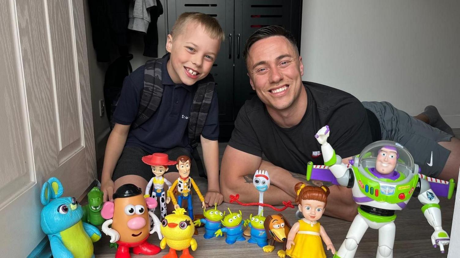 Vinny and his dad and his Toy Story toys.