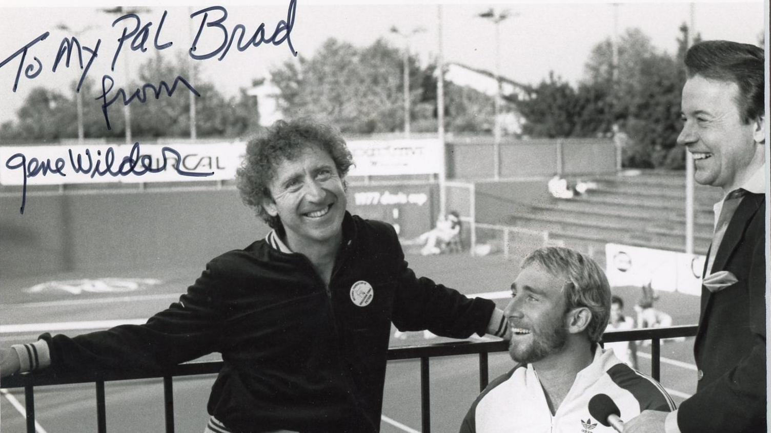 Brad Parks and Gene Wilder pose for a photo which Wilder has signed