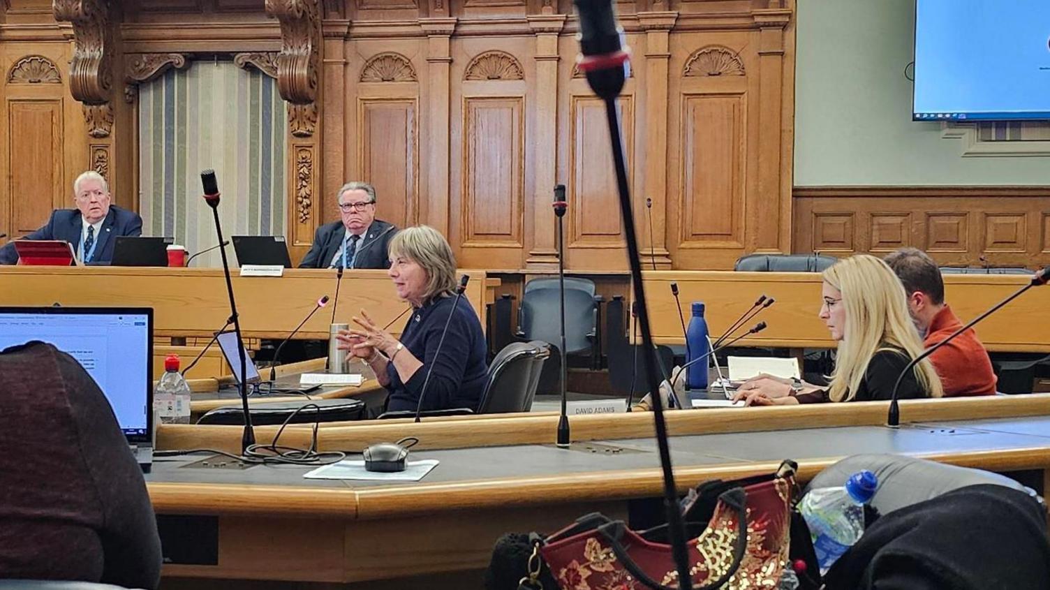 Councillor Sue Chandler (centre) takes questions from councillors over her decision to end funding for two family hubs on the isle of Sheppey and at Margate. 