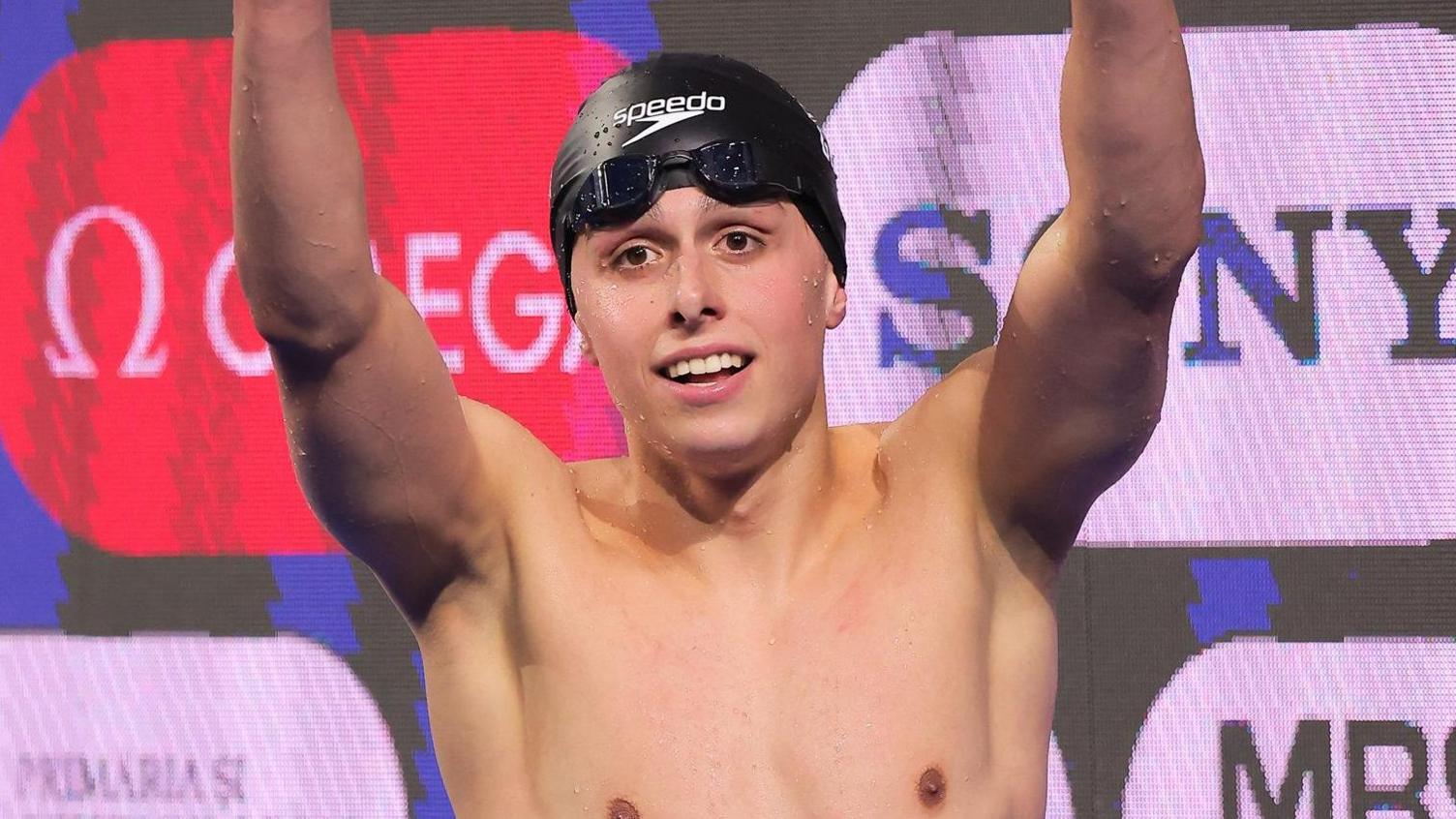 Filip Nowacki raises his arms in celebration