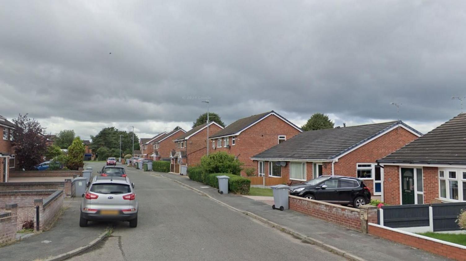 Heron Crescent in Crewe. A Google Maps image. Homes and cars can be seen.
