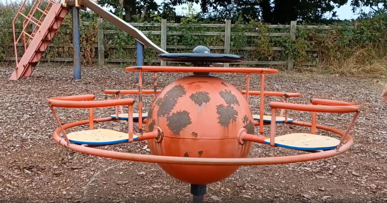 A rusty piece of play equipment