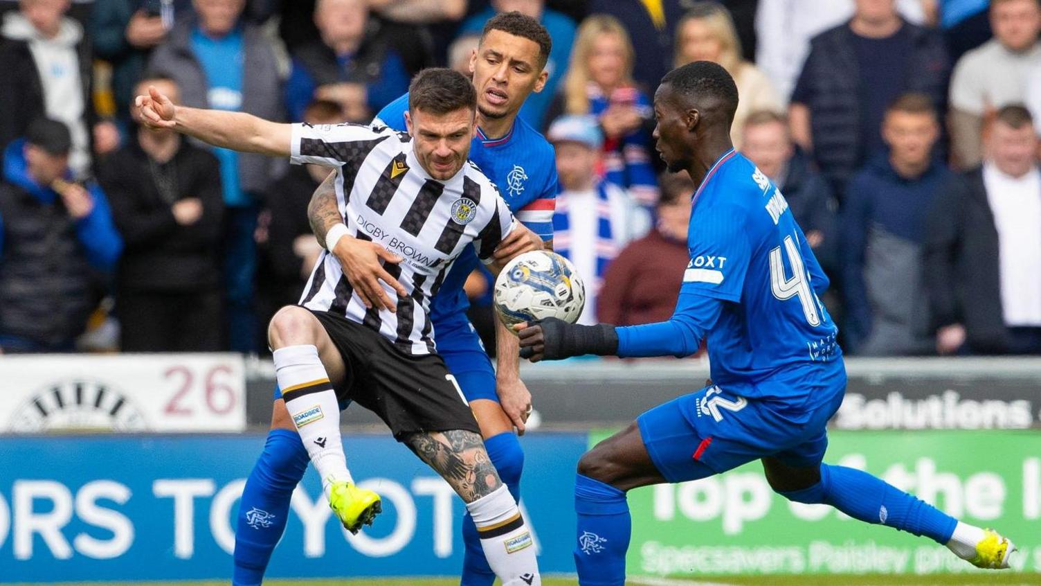 St Mirren's Greg Kiltie with Rangers' James Tavernier and Mohamed Diomande