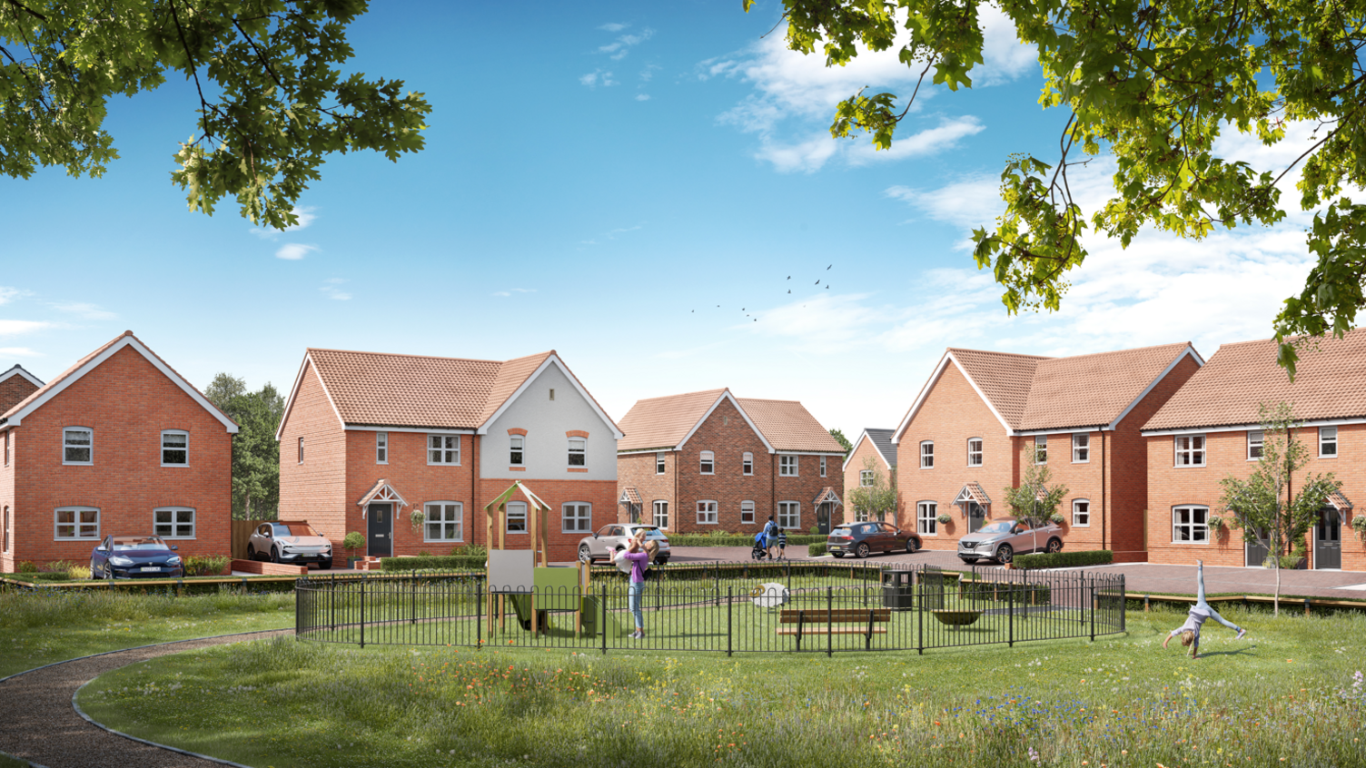 A computer generate image of a row of detached and semi detached red brick houses in from of a green area. Part of the green space is fenced off as a play area, where children and families are playing on the playground equipment.