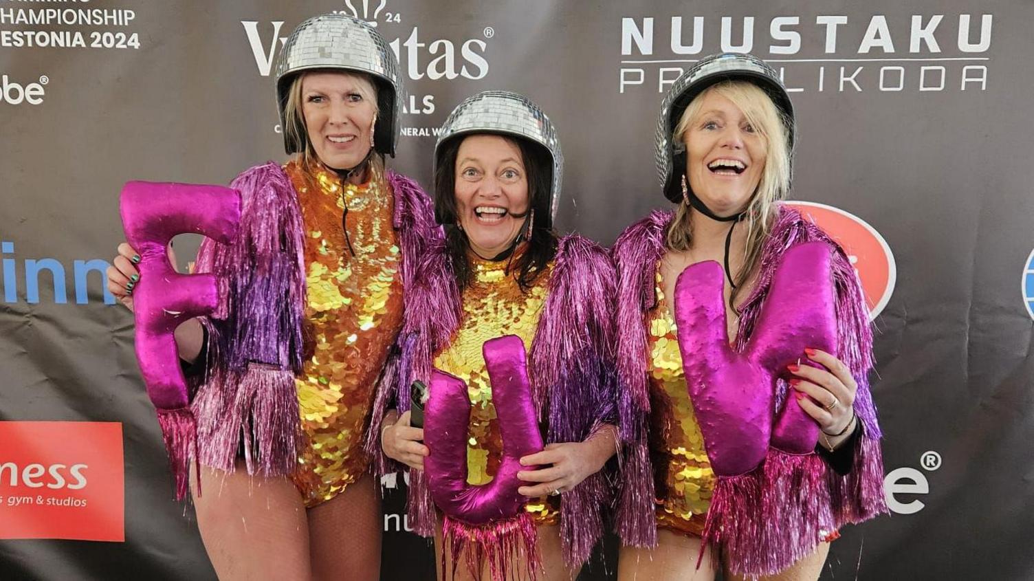 Members of the Disco Dippers in their performance outfits