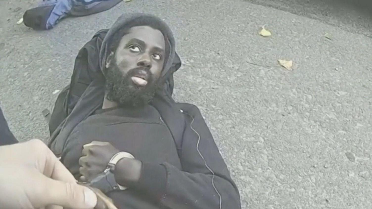 Police bodycam footage of Valdo Calocane being placed in handcuffs on the day of the Nottingham attacks on 13 June 2023 after he had fatally stabbed three people and tried to kill three others. 