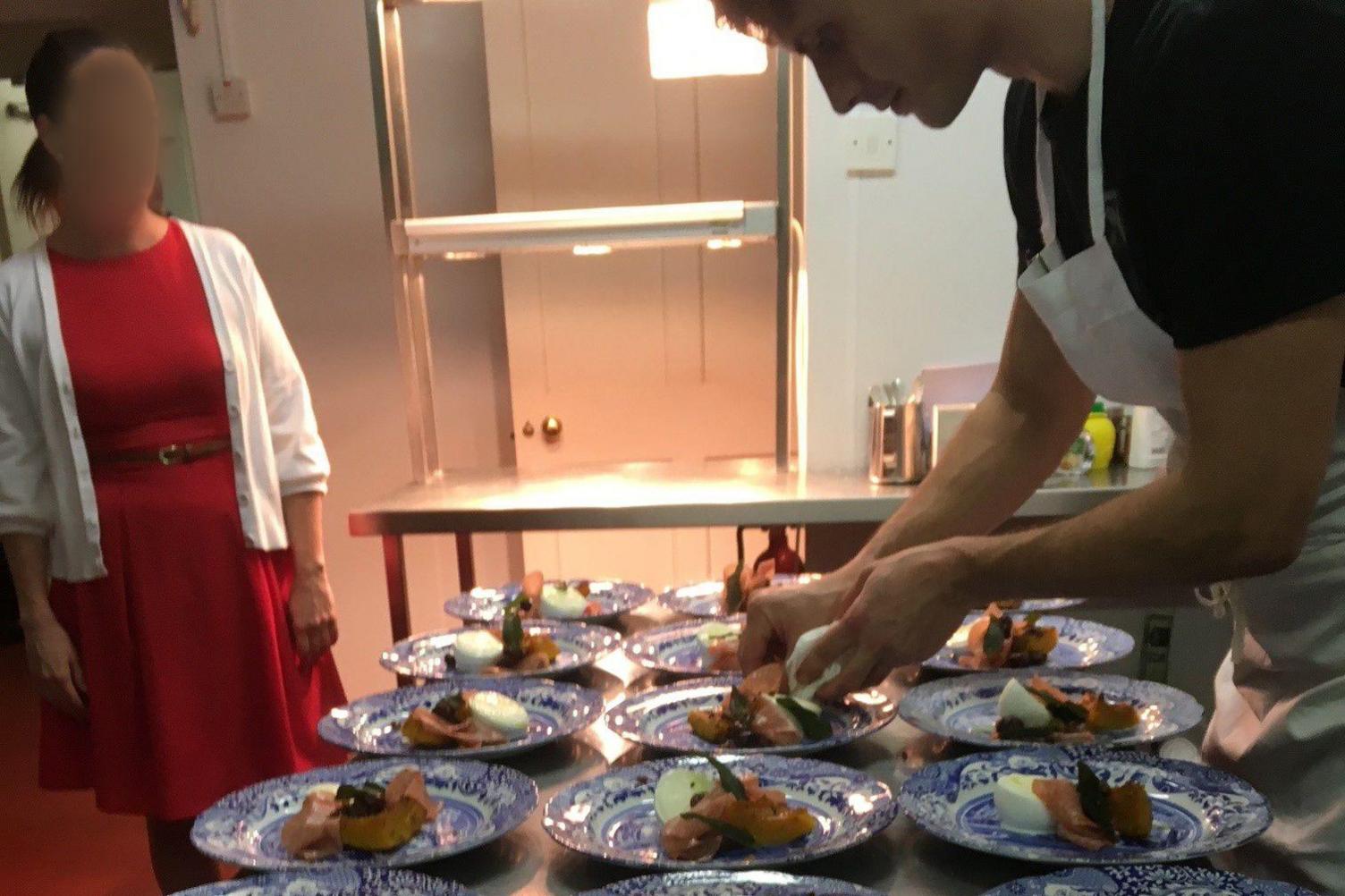 Chef Elliott Bloomfield preparing food