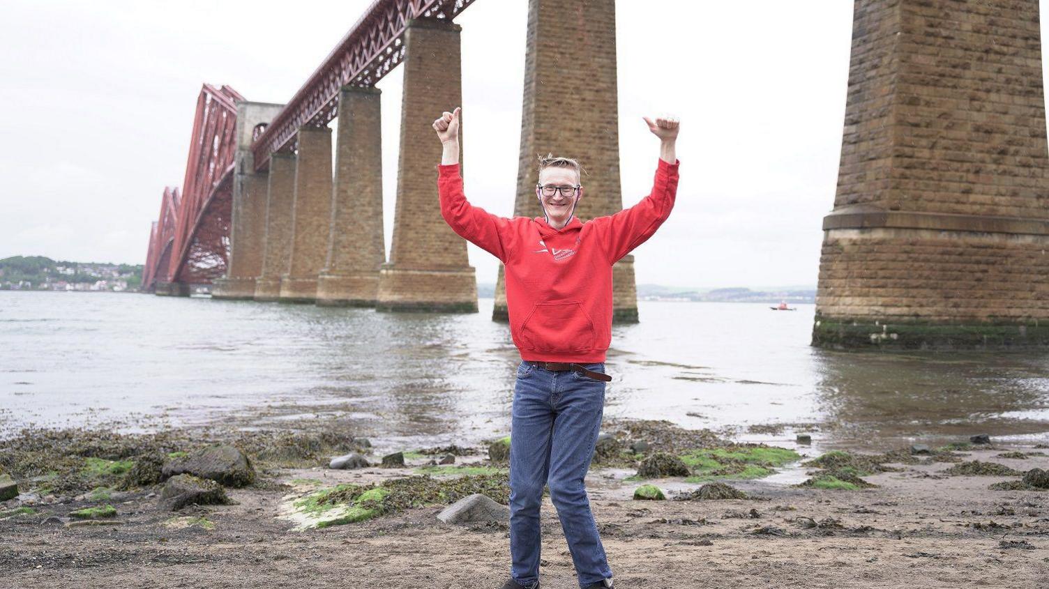 Josh McDonagh celebrating near the Fourth Bridge