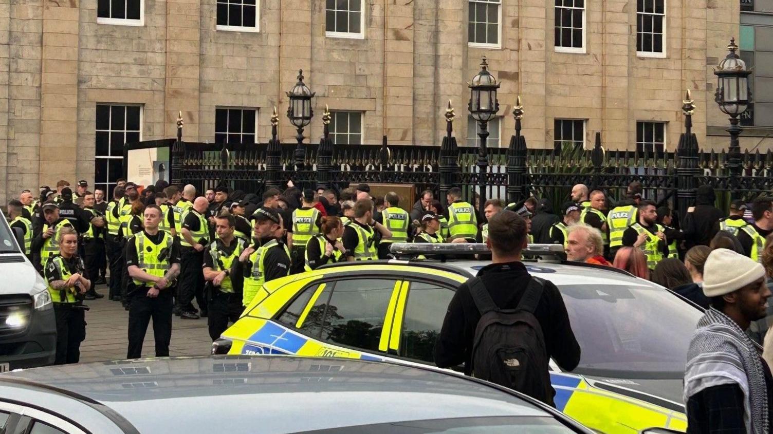 Multiple police officers attend disorder in St Andrews Square, Edinburgh.