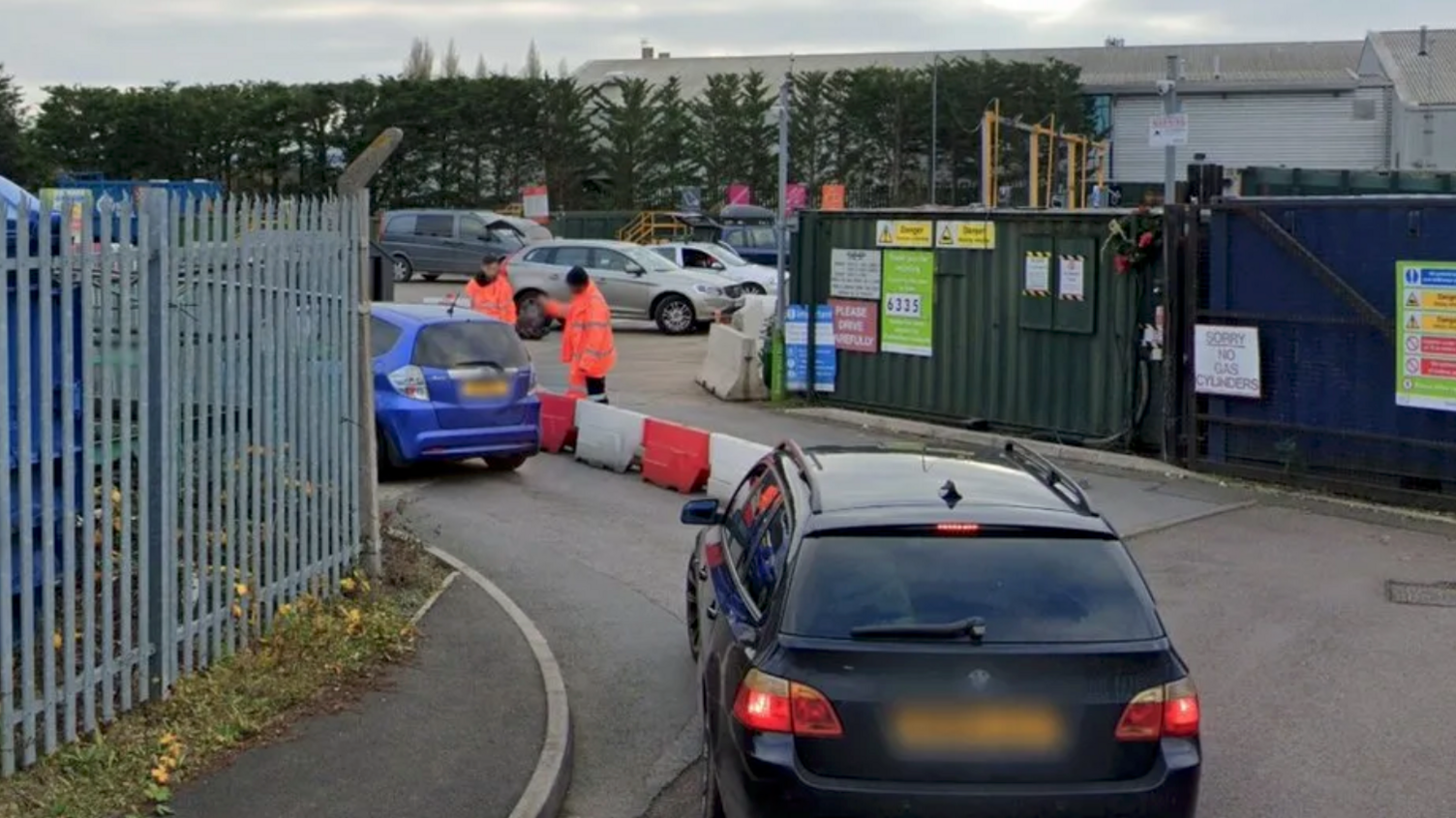 Residents arriving at a recycling centre