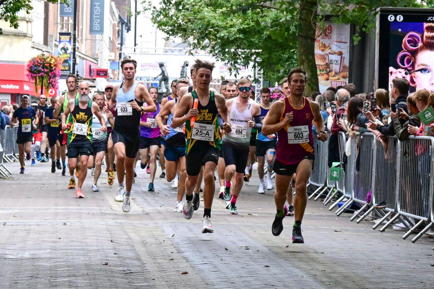 Runners on Abington Street in Northampton at the start of the 2023 Northampton half-marathon