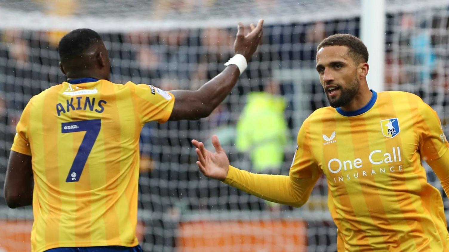 Jordan Bowery (right) celebrates his goal for Mansfield against Rotherham