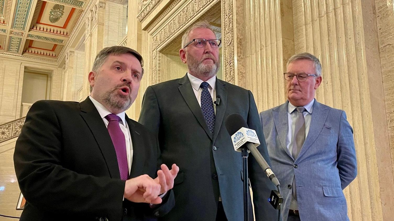 Robin Swann, Doug Beattie and Mike Nesbitt in the Great Hall at Stormont