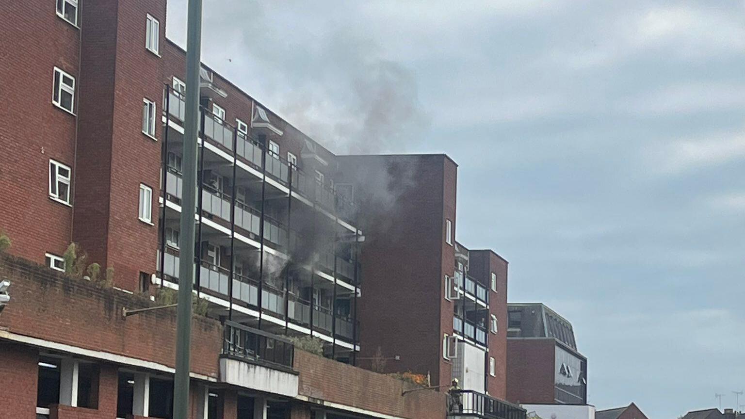 Smoke coming out of flats in Onslow Street