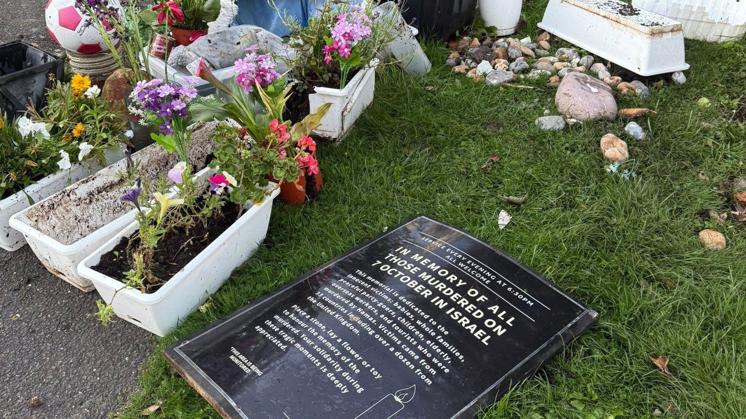 A damaged memorial in memory of those killed in the 7 October Hamas attack on Israel 