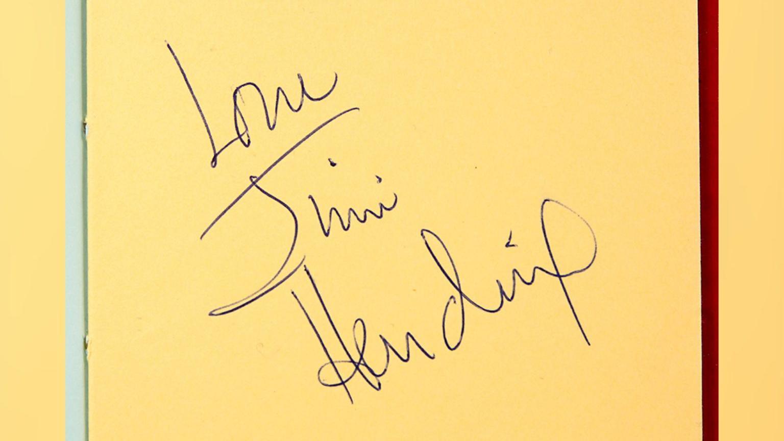 An autograph that reads 'Love, Jimi Hendrix'