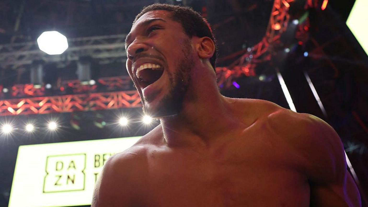 Joshua's dramatic win over Prenga in pictures
