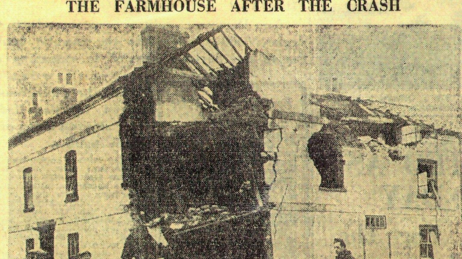 A yellow newspaper clipping of a picture showing a ruined house