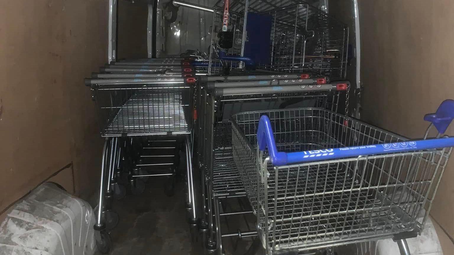 A van packed full of trollies