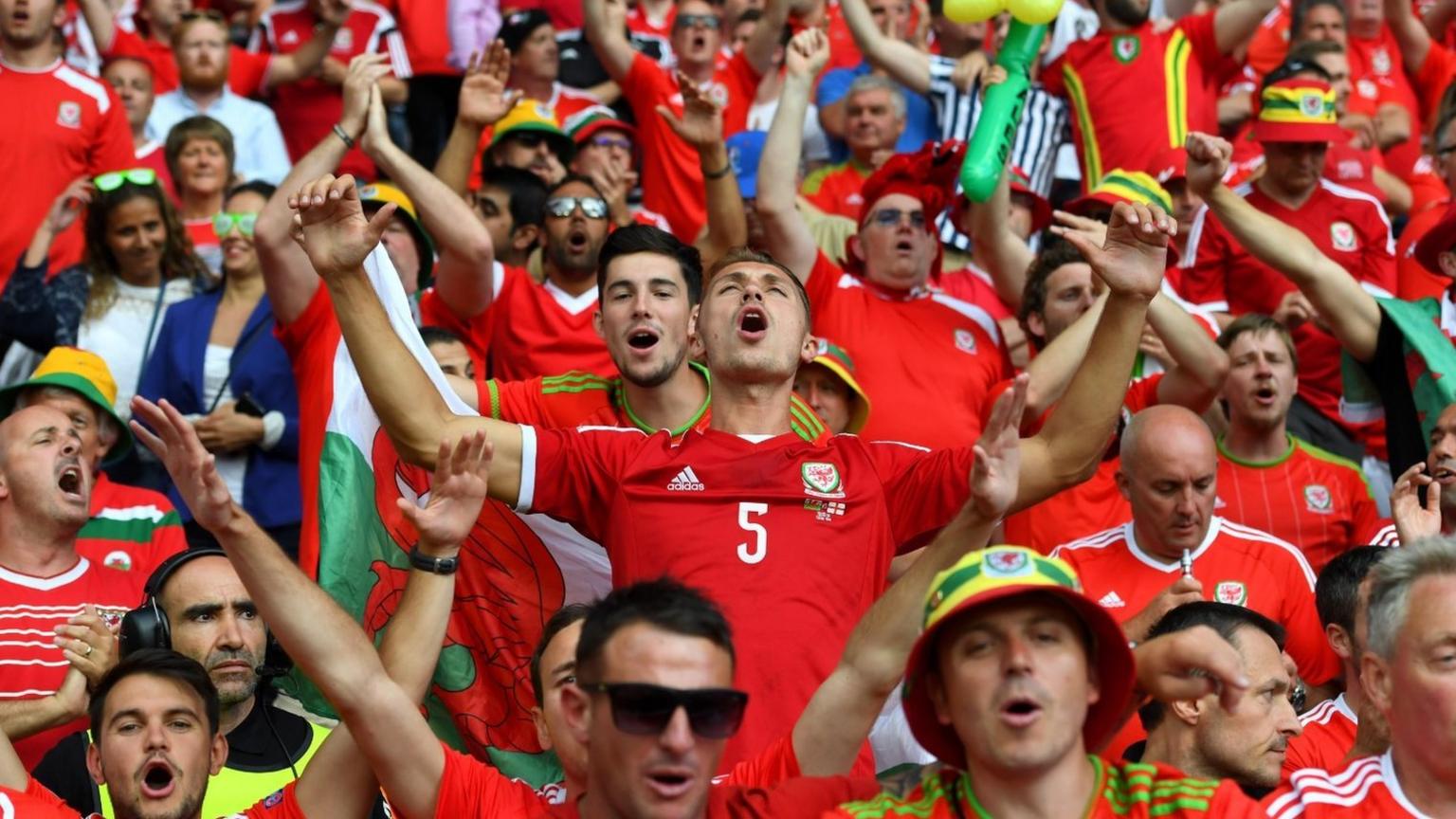 Wales fans celebrate their team's win over Northern Ireland