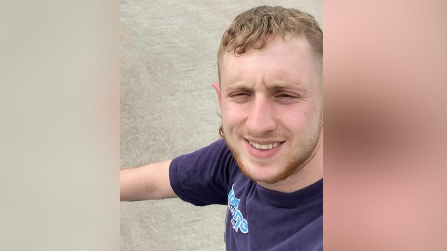 James Roberts, who has blonde hair and a short beard of the same colour. He is smiling in the photo.